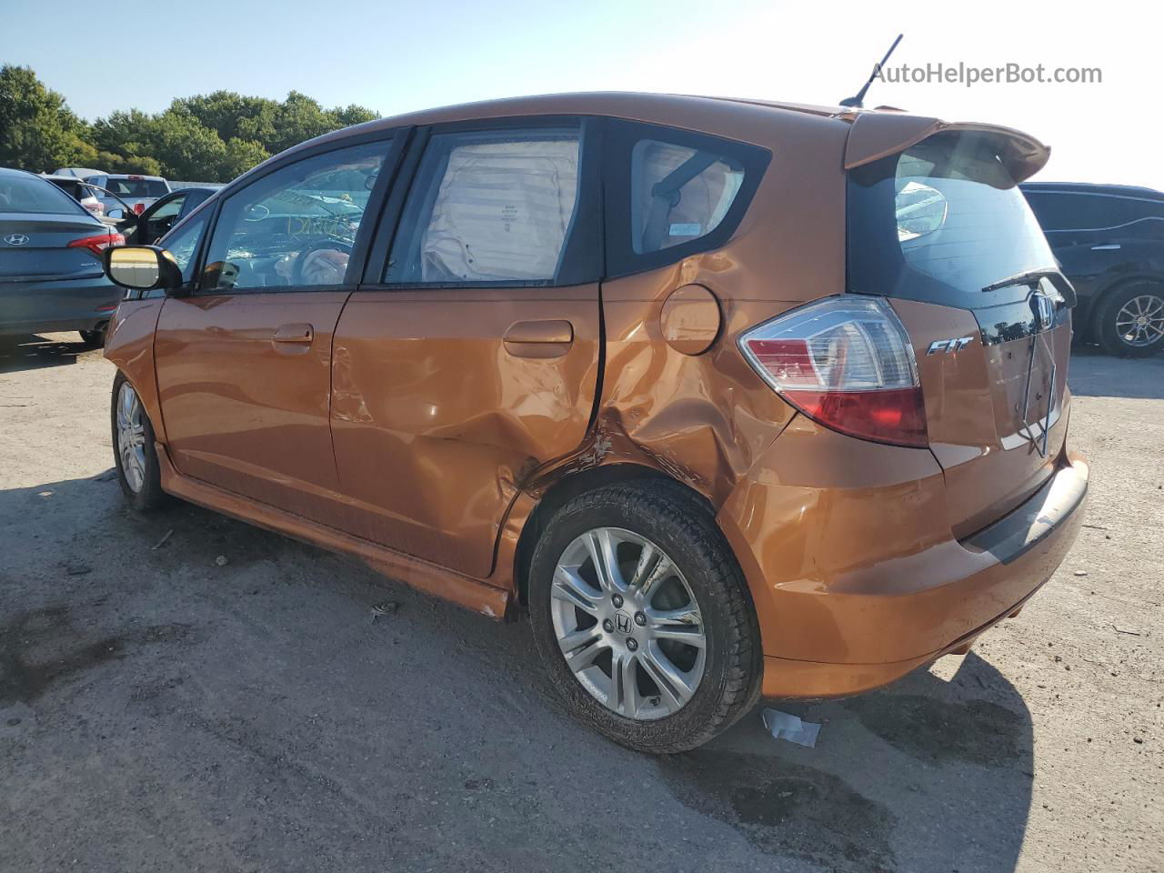 2009 Honda Fit Sport Orange vin: JHMGE88629S048607