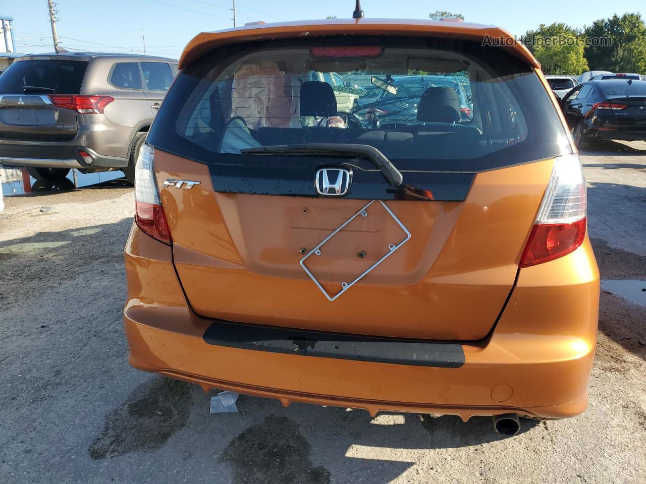 2009 Honda Fit Sport Orange vin: JHMGE88629S048607