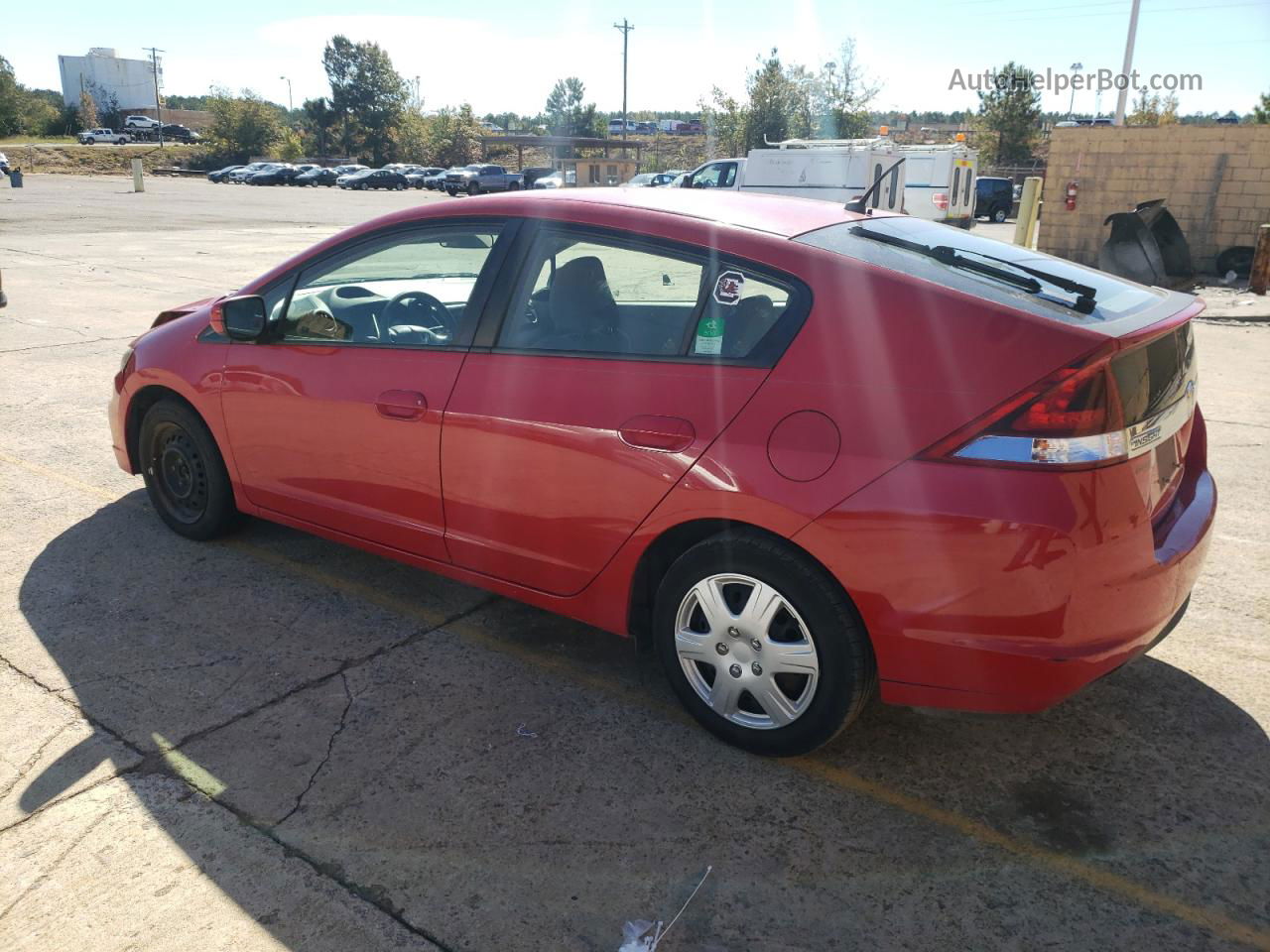 2012 Honda Insight  Red vin: JHMZE2H37CS000636