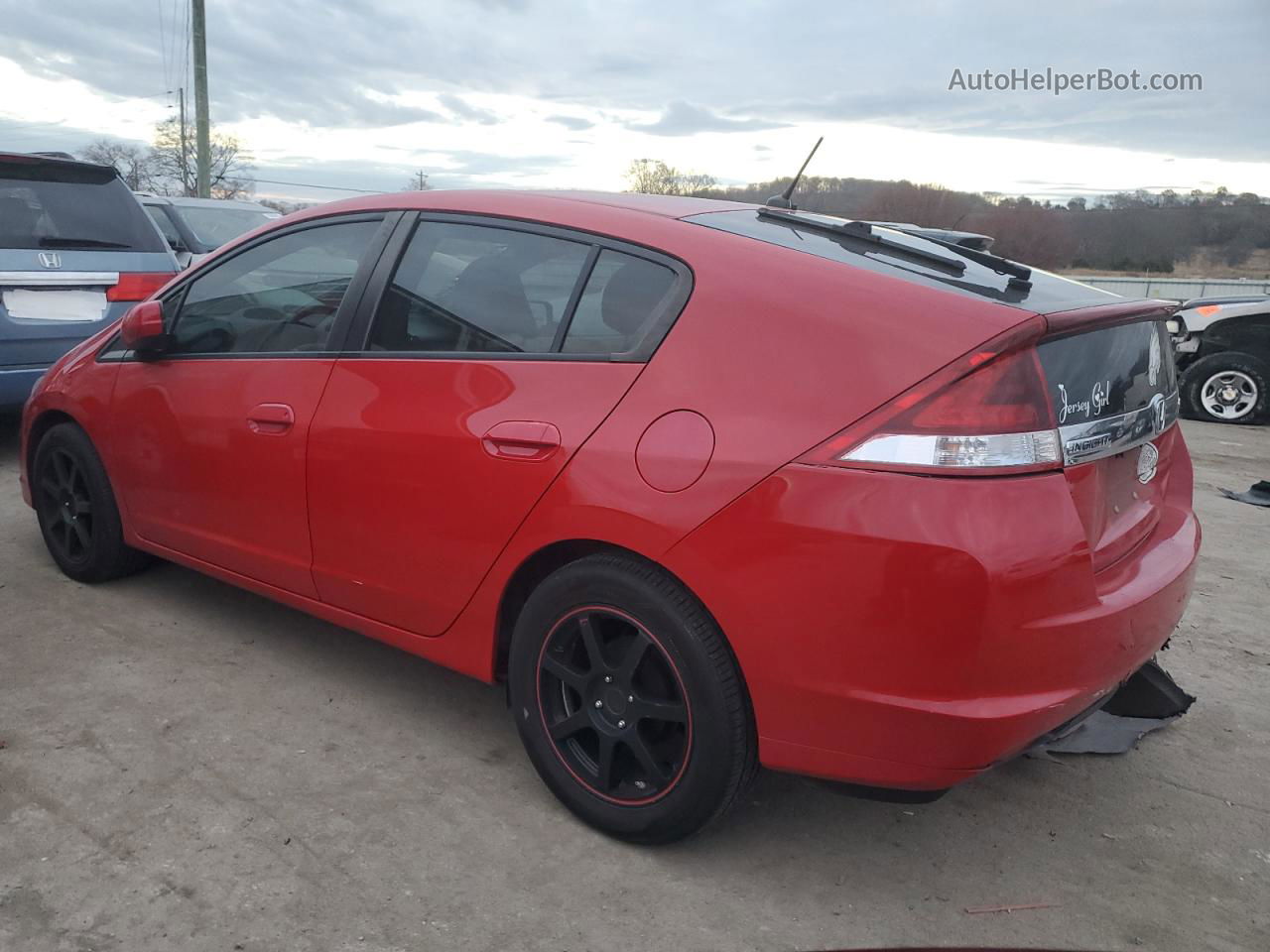 2012 Honda Insight  Red vin: JHMZE2H38CS006283