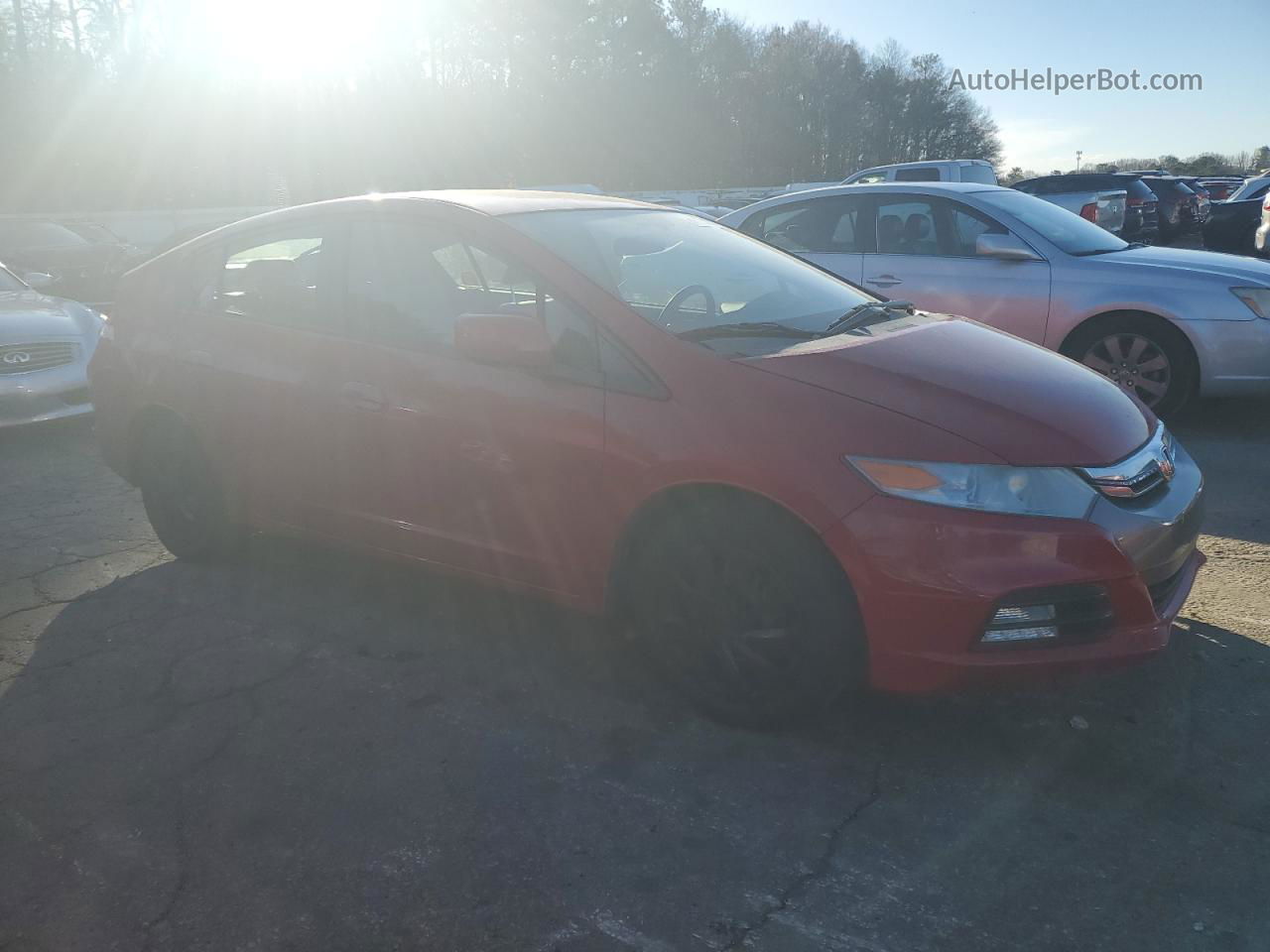 2012 Honda Insight  Red vin: JHMZE2H39CS004302