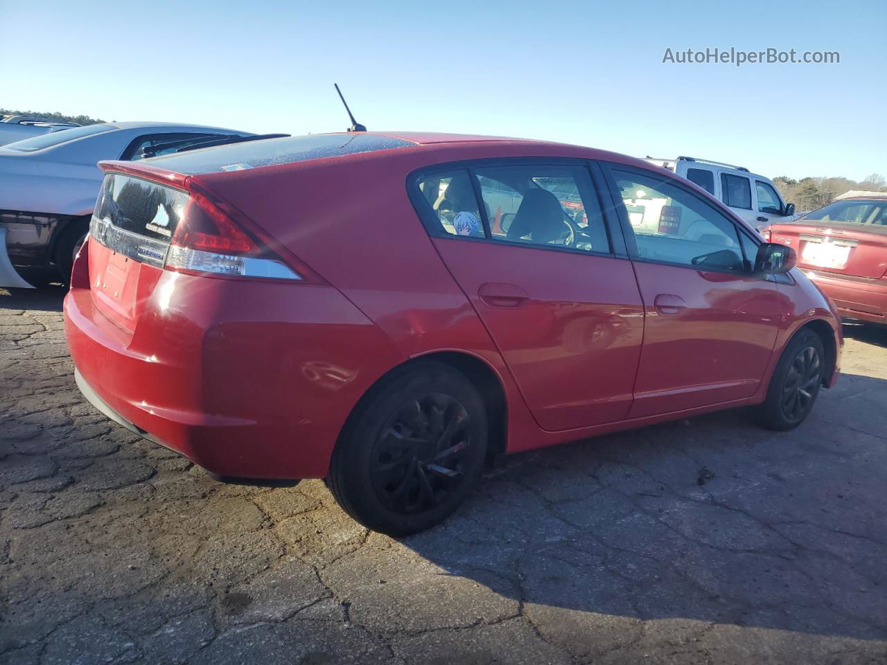 2012 Honda Insight  Red vin: JHMZE2H39CS004302