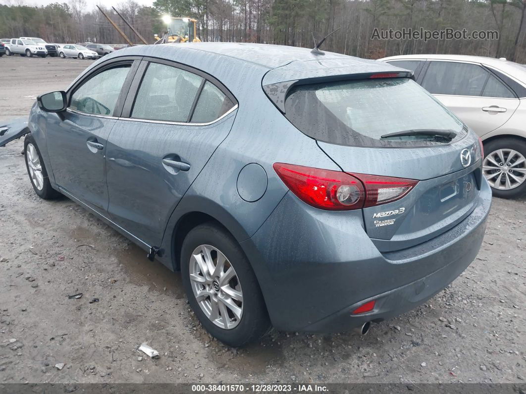 2014 Mazda Mazda3 I Touring Teal vin: JM1BM1L79E1120568