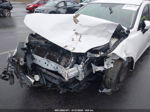 2014 Mazda Mazda3   Белый vin: JM1BM1U74E1120010