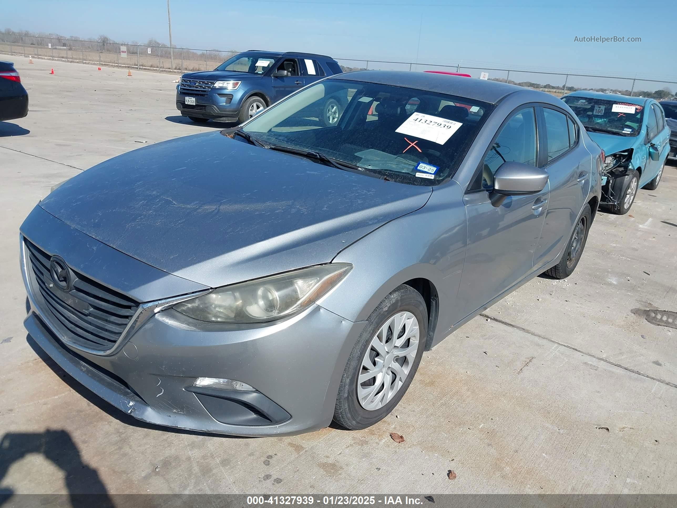 2014 Mazda Mazda3 I Sport Silver vin: JM1BM1U79E1141385