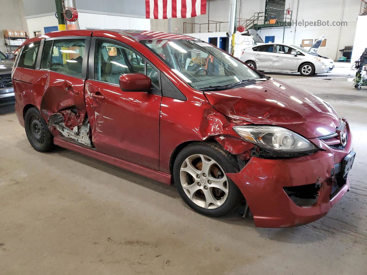 2010 Mazda 5  Red vin: JM1CR2W32A0372912