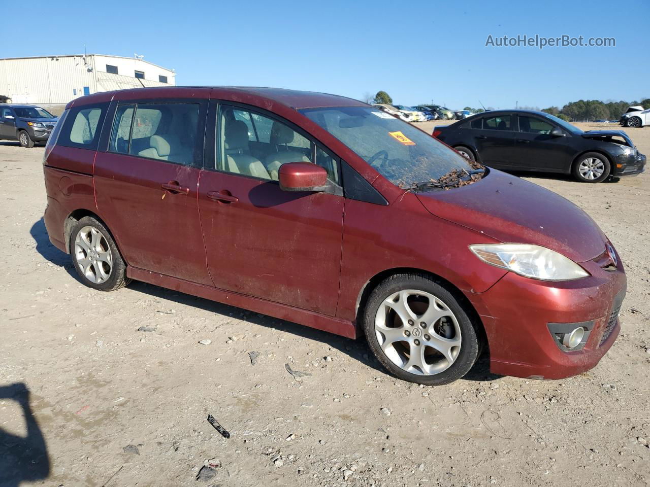 2010 Mazda 5  Red vin: JM1CR2W35A0384388