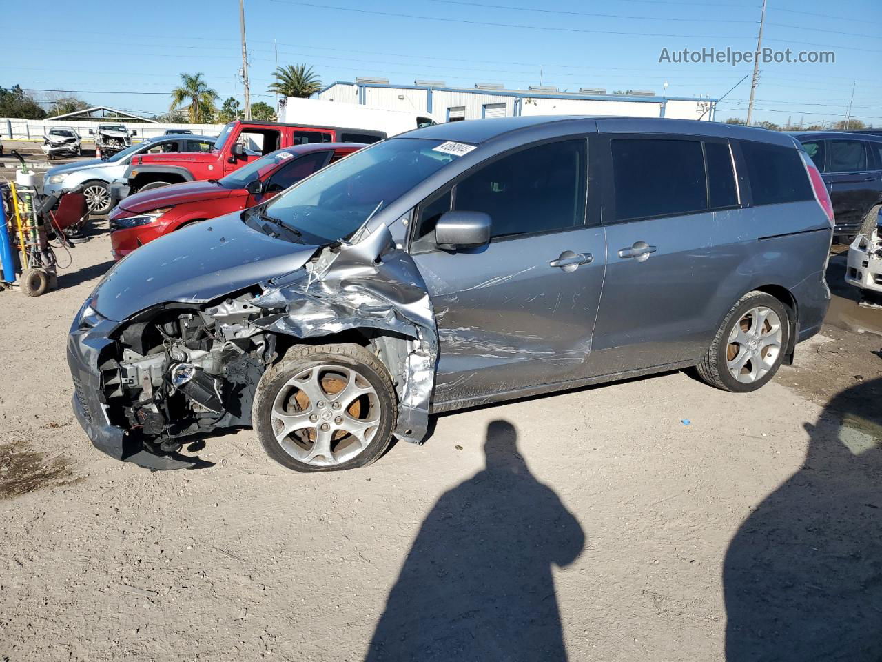 2010 Mazda 5  Серебряный vin: JM1CR2W36A0377594