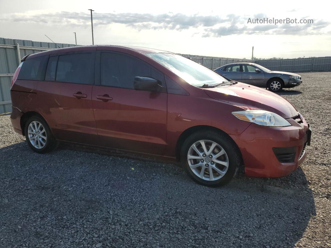 2010 Mazda 5  Red vin: JM1CR2W38A0371179