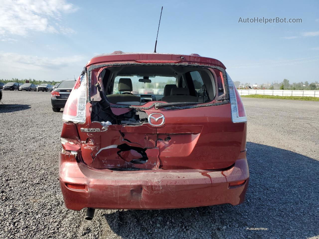 2010 Mazda 5  Red vin: JM1CR2W38A0371179