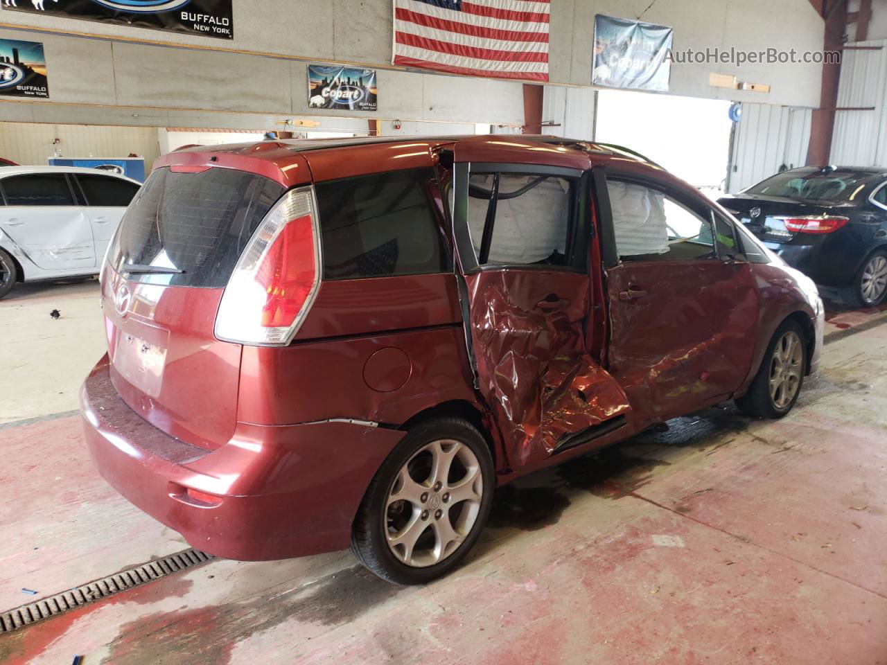 2010 Mazda 5  Red vin: JM1CR2W38A0384255