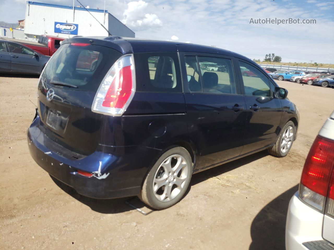 2010 Mazda 5  Blue vin: JM1CR2W39A0381087