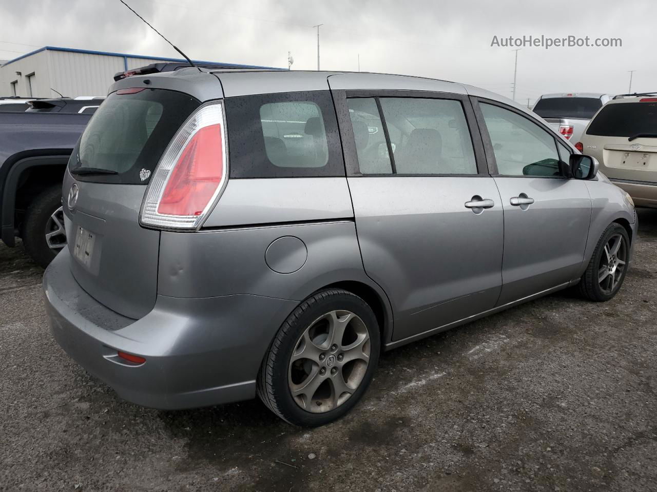 2010 Mazda 5  Серебряный vin: JM1CR2W39A0384054