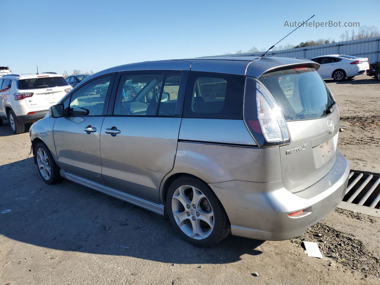 2010 Mazda 5  Серебряный vin: JM1CR2W3XA0382071