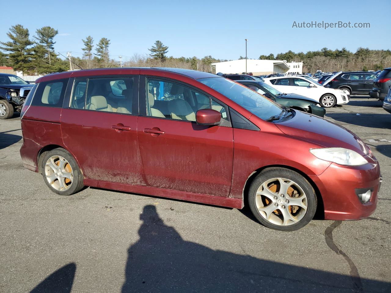 2010 Mazda 5  Red vin: JM1CR2WL1A0381651