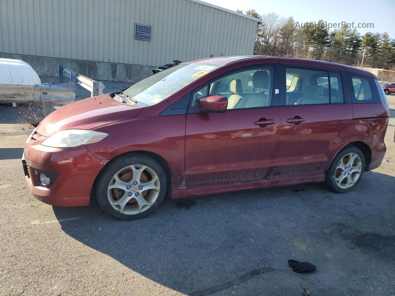 2010 Mazda 5  Red vin: JM1CR2WL1A0381651