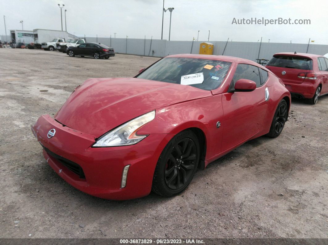 2014 Nissan 370z   Red vin: JN1AZ4EH0EM637182