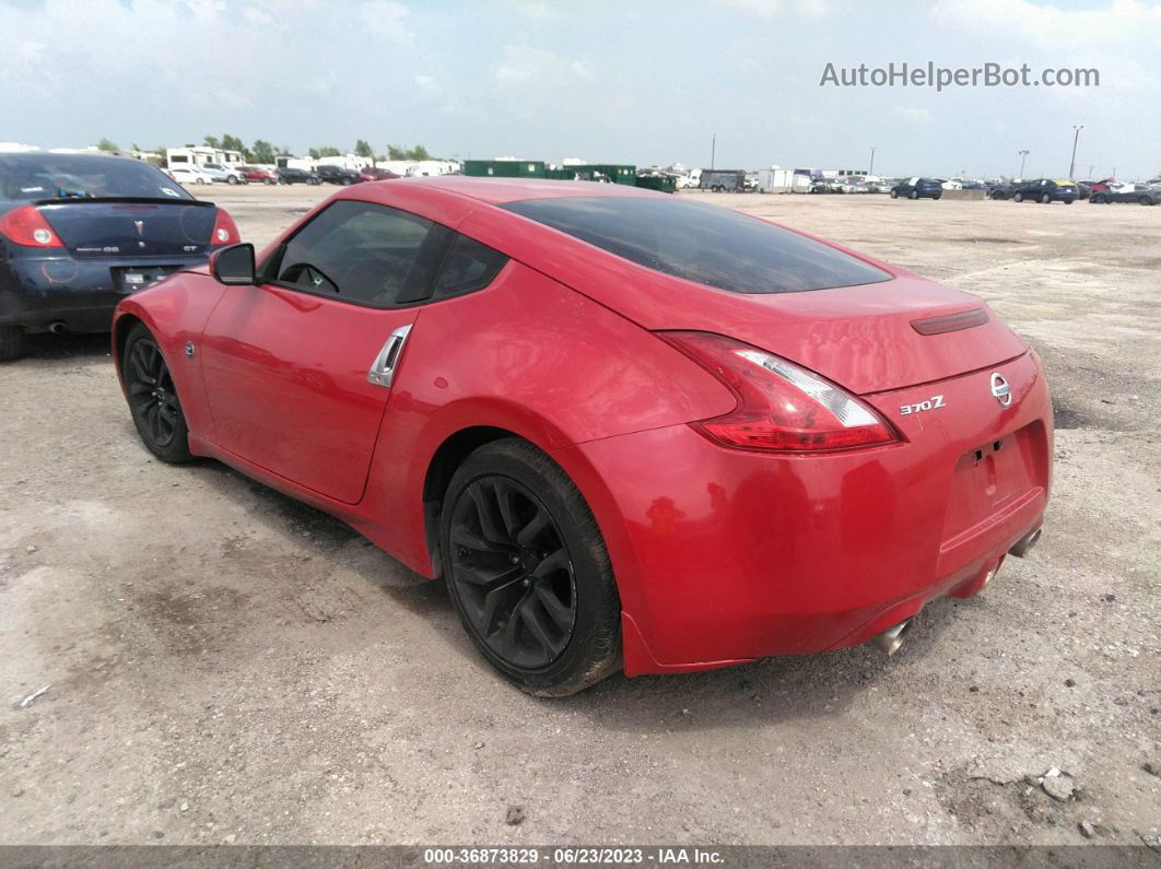 2014 Nissan 370z   Red vin: JN1AZ4EH0EM637182