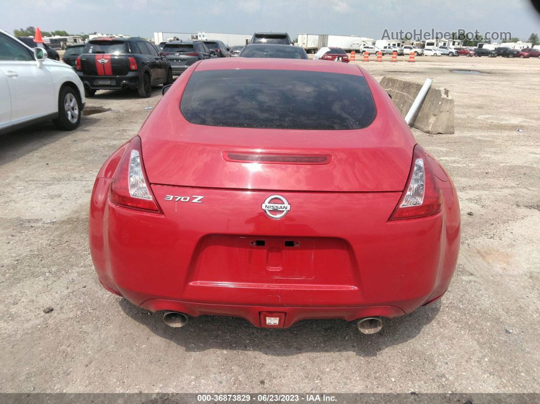 2014 Nissan 370z   Red vin: JN1AZ4EH0EM637182