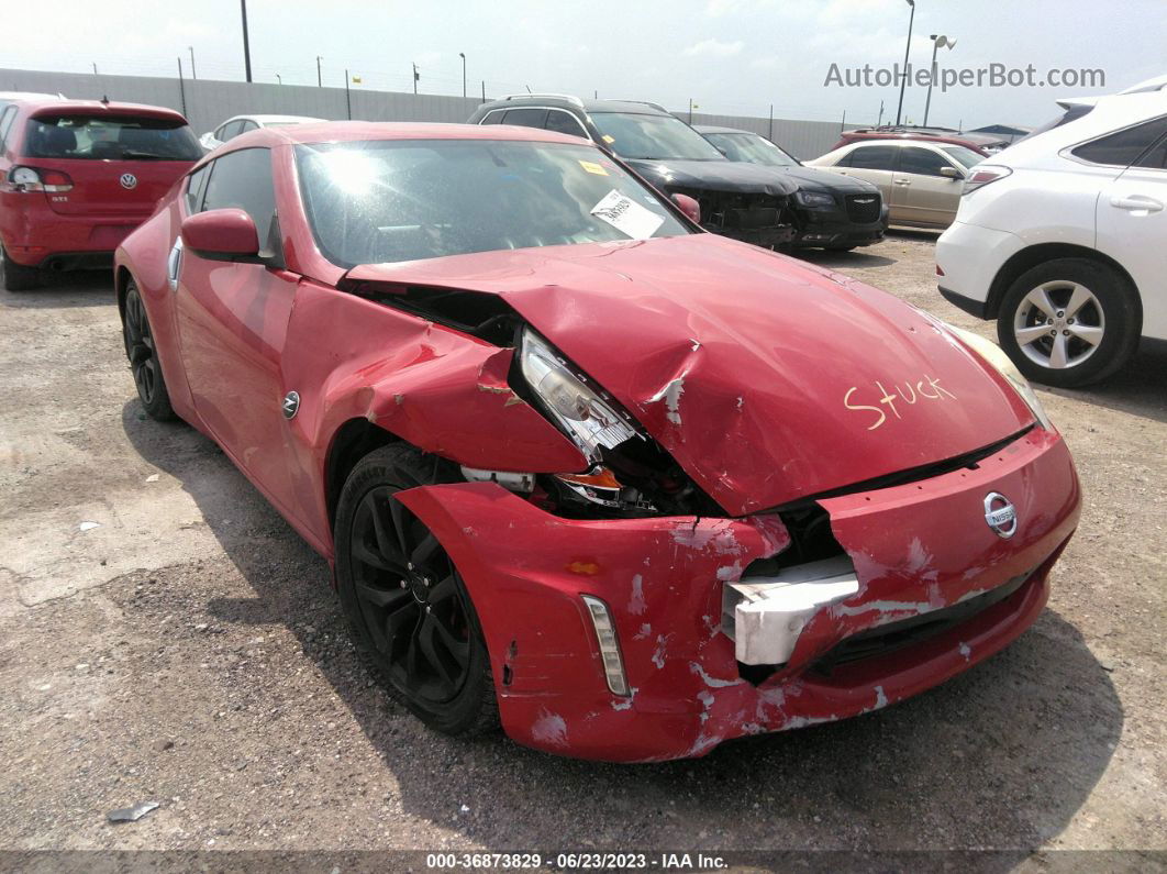 2014 Nissan 370z   Red vin: JN1AZ4EH0EM637182