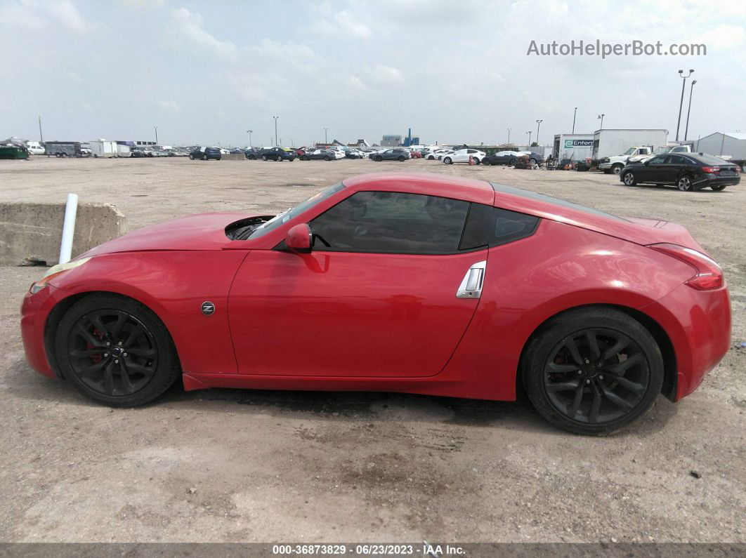 2014 Nissan 370z   Red vin: JN1AZ4EH0EM637182