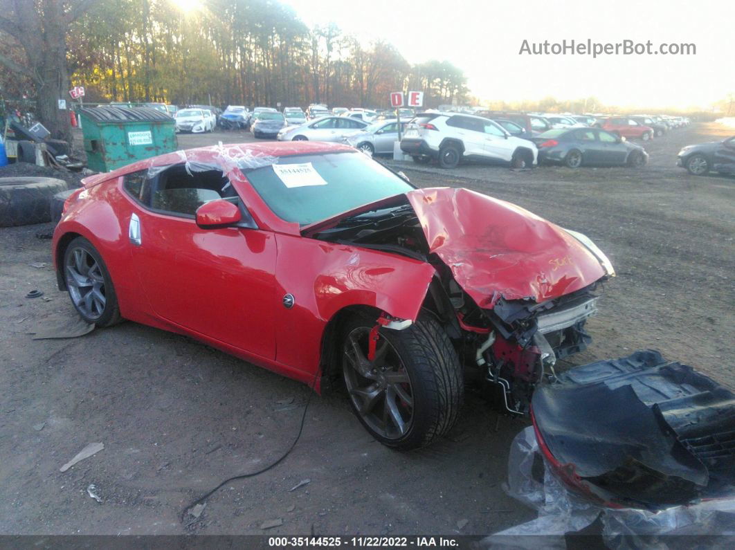 2014 Nissan 370z   Red vin: JN1AZ4EH3EM634177