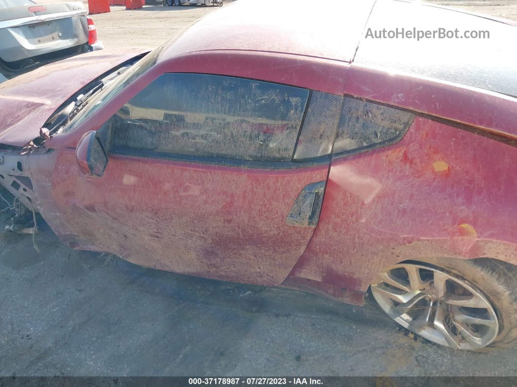 2014 Nissan 370z   Red vin: JN1AZ4EH7EM633162