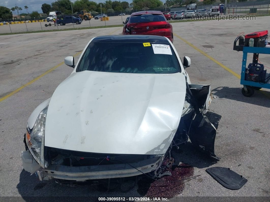 2014 Nissan 370z   White vin: JN1AZ4EH7EM633260