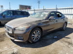 2014 Infiniti Q50 Base Коричневый vin: JN1BV7AR1EM680929