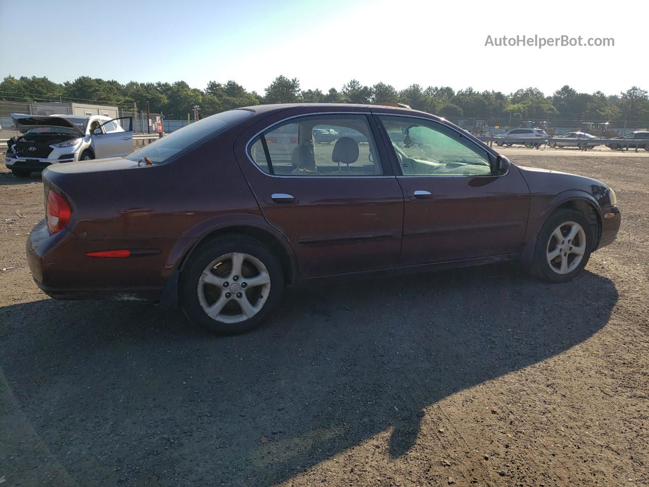 2000 Nissan Maxima Gle Red vin: JN1CA31A7YT033397