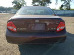 2000 Nissan Maxima Gle Red vin: JN1CA31A7YT033397