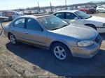 2000 Nissan Maxima Gle/gxe/se Золотой vin: JN1CA31AXYT209455