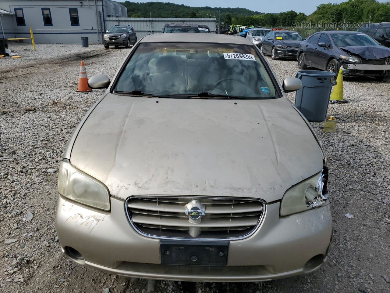 2000 Nissan Maxima Gle Tan vin: JN1CA31D2YT711502