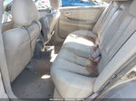 2000 Nissan Maxima Gle Tan vin: JN1CA31D3YT728003