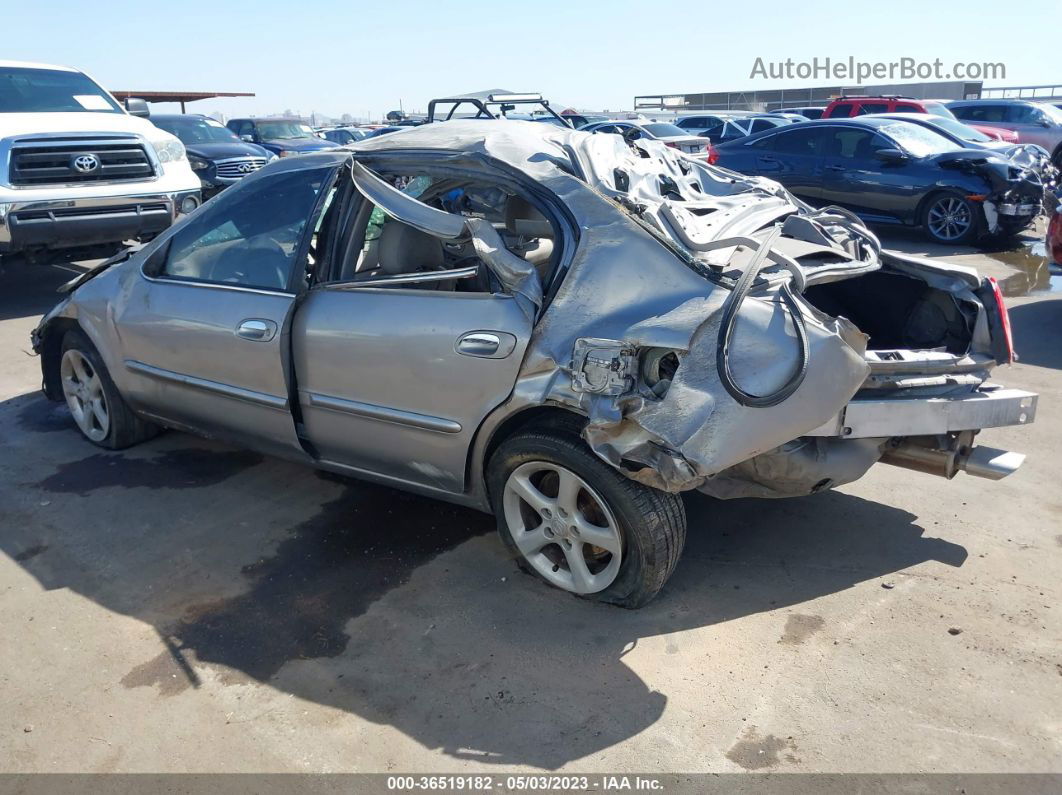 2000 Nissan Maxima Gle Tan vin: JN1CA31D3YT728003