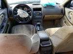 2000 Nissan Maxima Gle Tan vin: JN1CA31D4YT524147