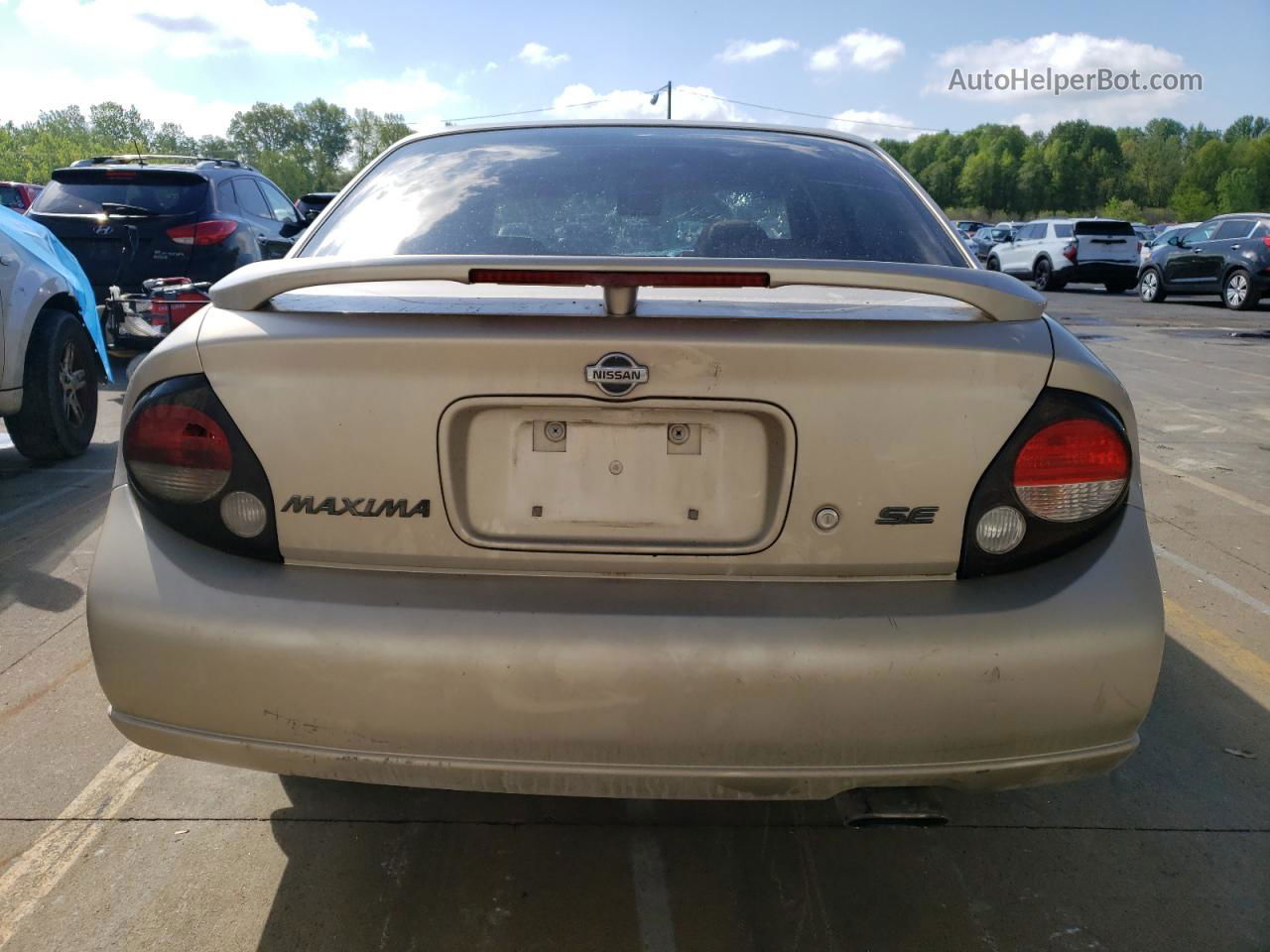 2000 Nissan Maxima Gle Tan vin: JN1CA31D4YT524147