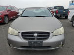 2000 Nissan Maxima Gle Tan vin: JN1CA31D7YT541377