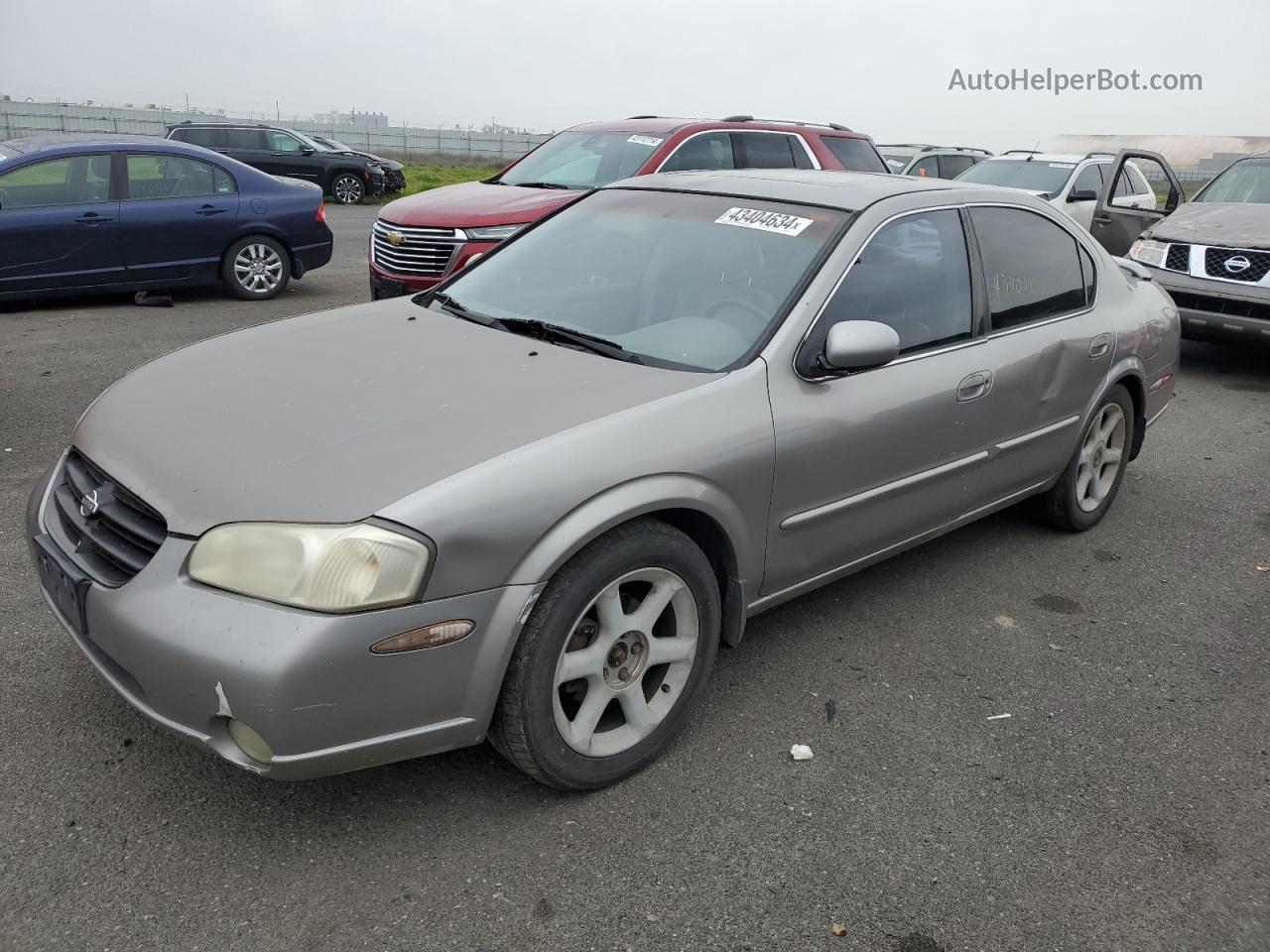 2000 Nissan Maxima Gle Tan vin: JN1CA31D7YT541377