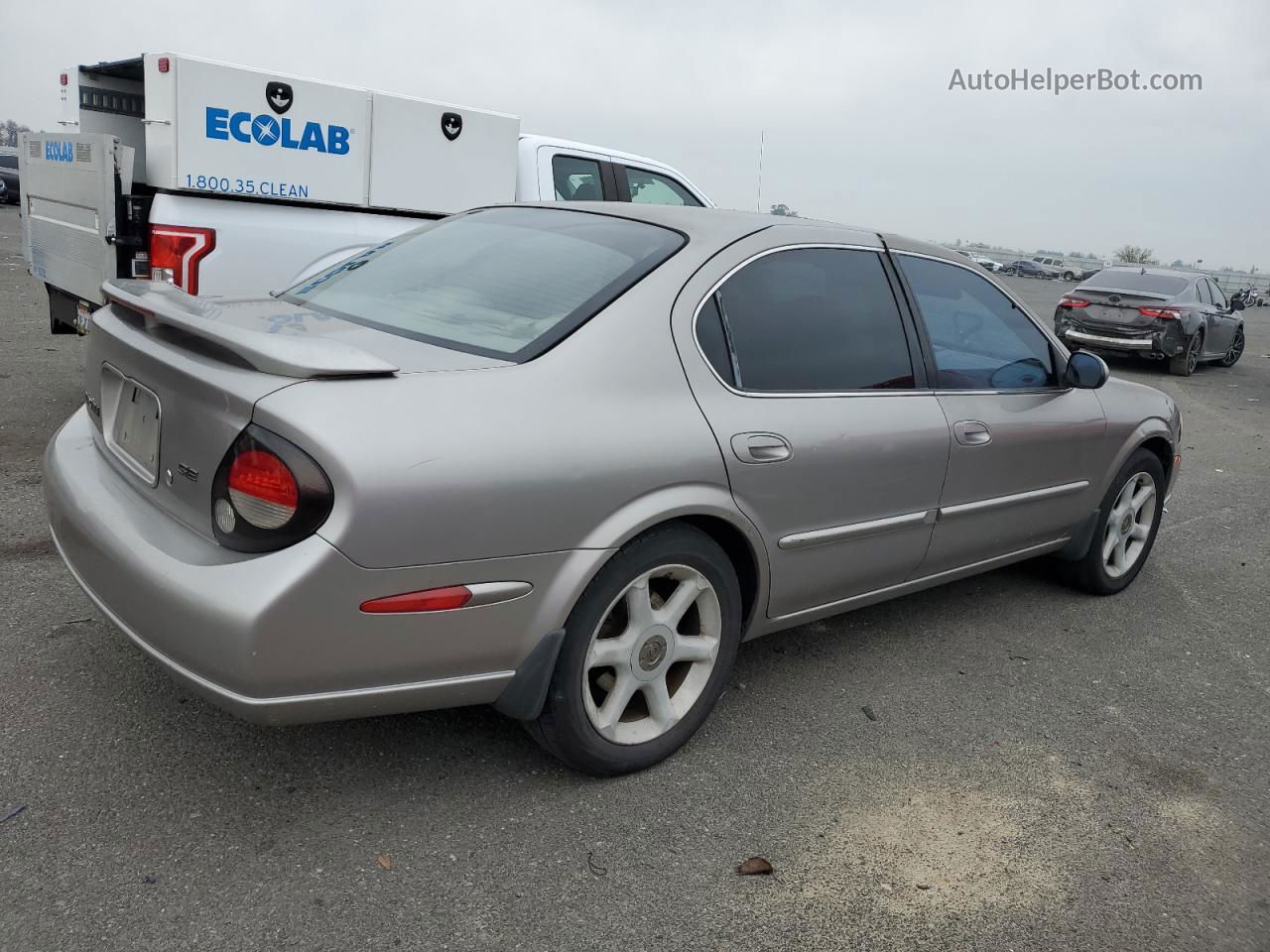 2000 Nissan Maxima Gle Tan vin: JN1CA31D7YT541377