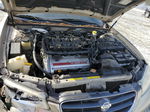 2000 Nissan Maxima Gle Gold vin: JN1CA31DXYT740732