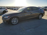 2016 Infiniti Q50 Premium Коричневый vin: JN1EV7AP9GM302890