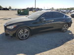 2019 Infiniti Q50 Luxe Черный vin: JN1EV7AR3KM590013