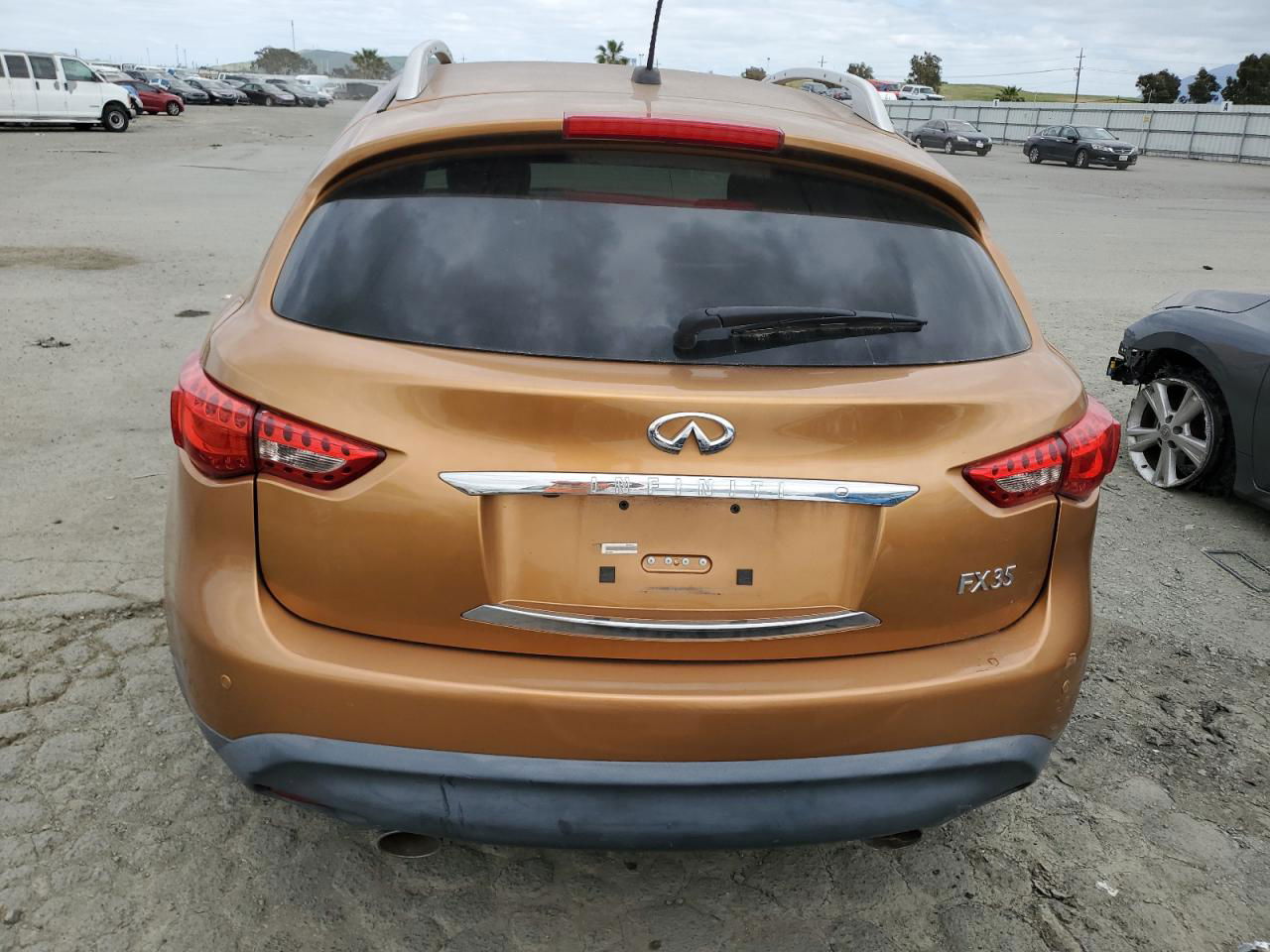 2009 Infiniti Fx35  Gold vin: JNRAS18U79M100890