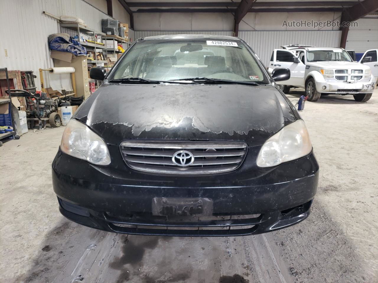 2004 Toyota Corolla Ce Black vin: JTDBR32E040051707