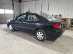 2004 Toyota Corolla Ce Black vin: JTDBR32E040051707