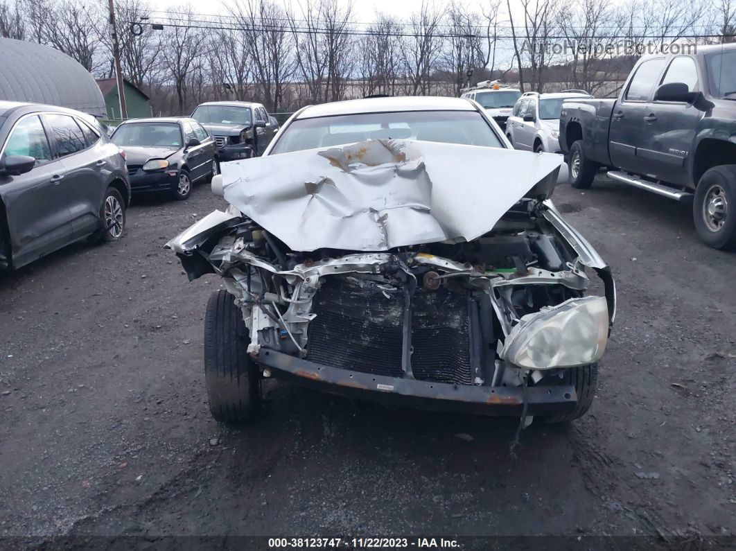 2004 Toyota Corolla Le Silver vin: JTDBR32E642029327