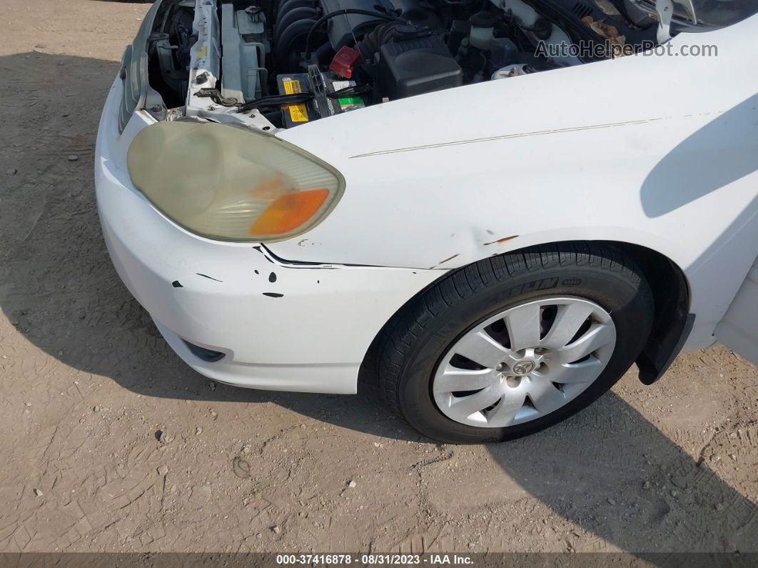 2003 Toyota Corolla Le White vin: JTDBR32E930006571