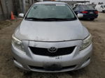 2010 Toyota Corolla Base Silver vin: JTDBU4EE0A9110097