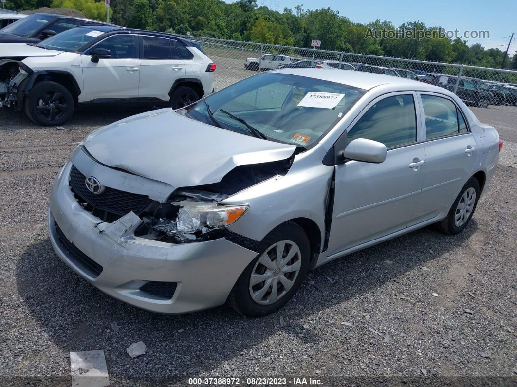 2010 Toyota Corolla Le Silver vin: JTDBU4EE1AJ087458